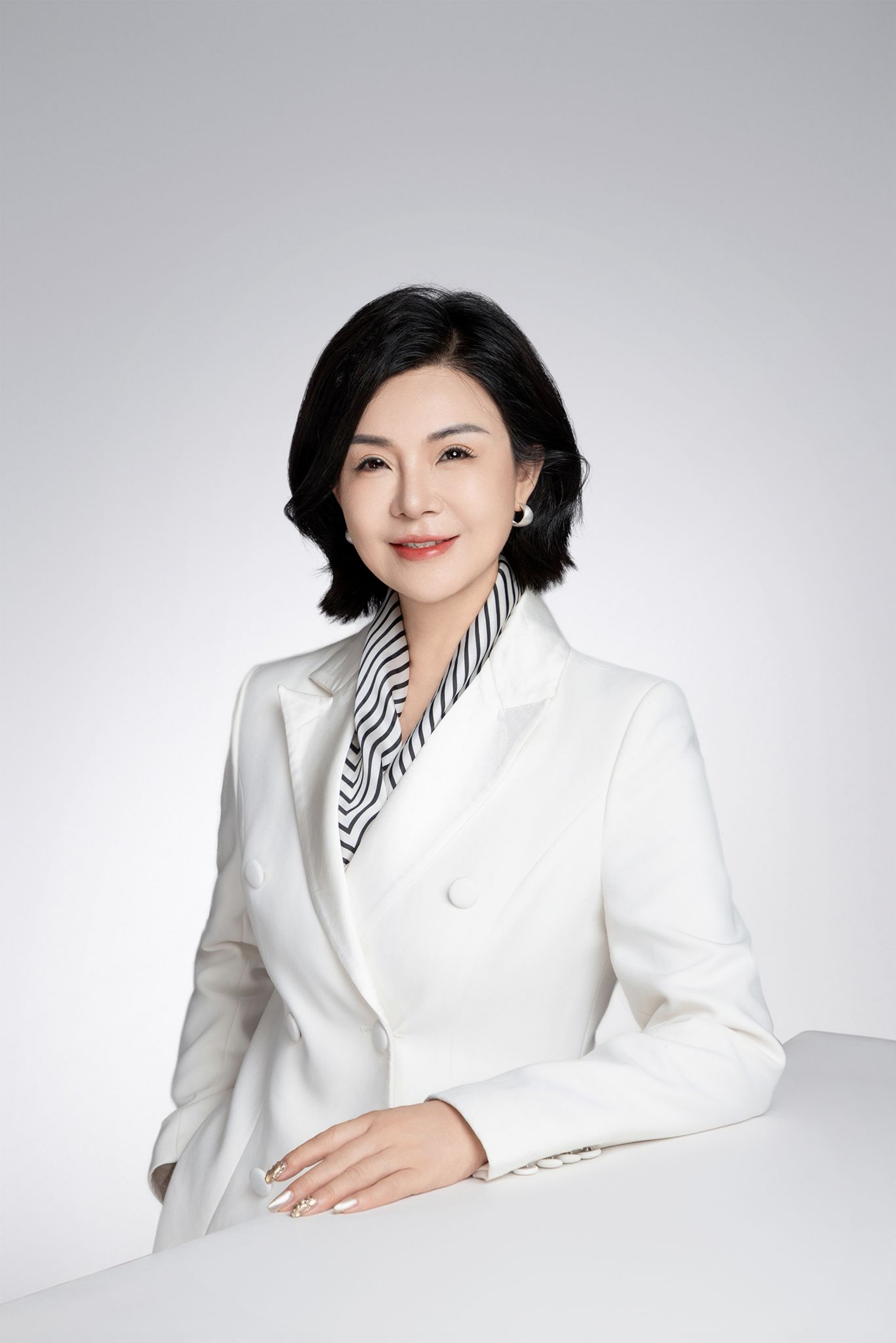 廖興梅女士